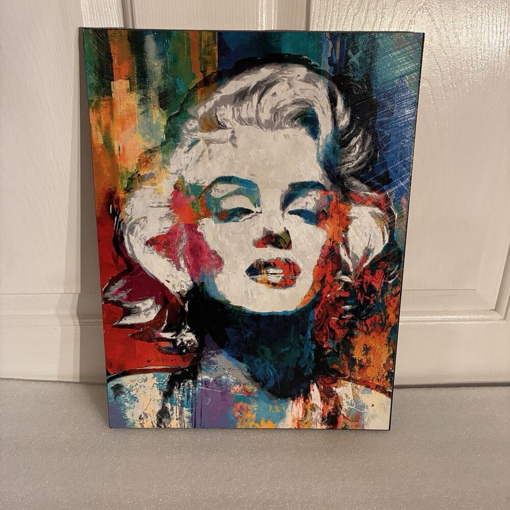 Marilyn Monroe multicolor picture on compressed wood. measures 12"x16"